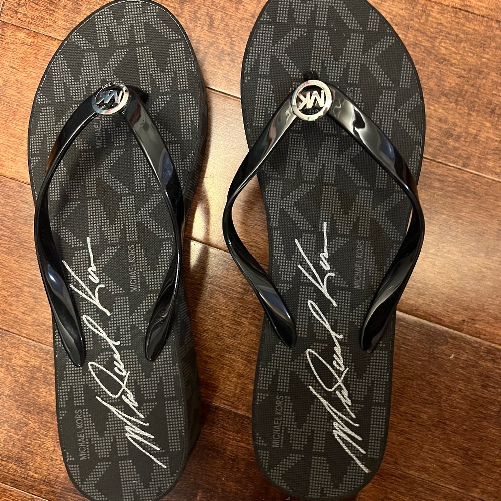Michael Kors flip flops NWOT